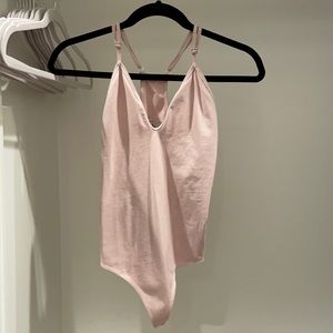 Light pink size XS bodysuit